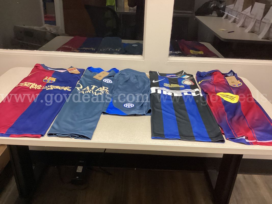 Lot of 4 Soccer Jerseys and a pair of Shorts