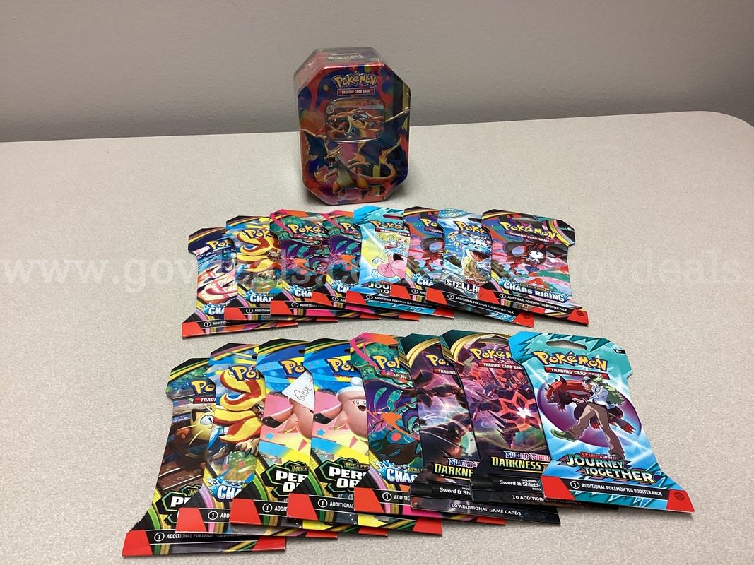 Pokémon Mega Charizard Y Tin and 16 Sleeved Booster Packs