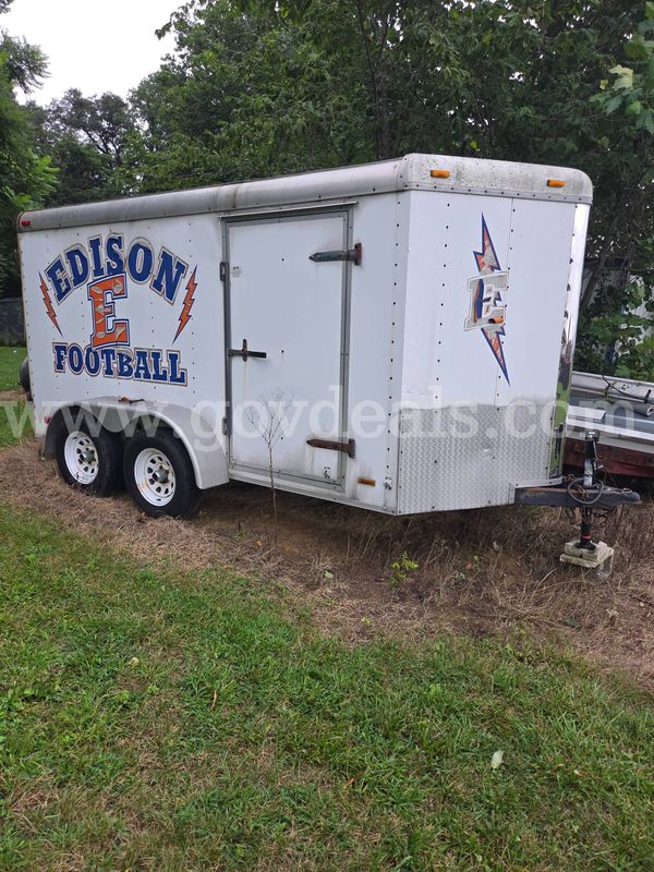 6X12 V-NOSE CARGO TRAILER WITH DUAL AXLES AND BARN DOORS ON REAR AND SIDE DOOR.