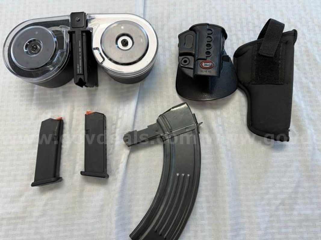 Lot of Magazines, Holsters, Assorted Ammunition, and Shotgun Shells