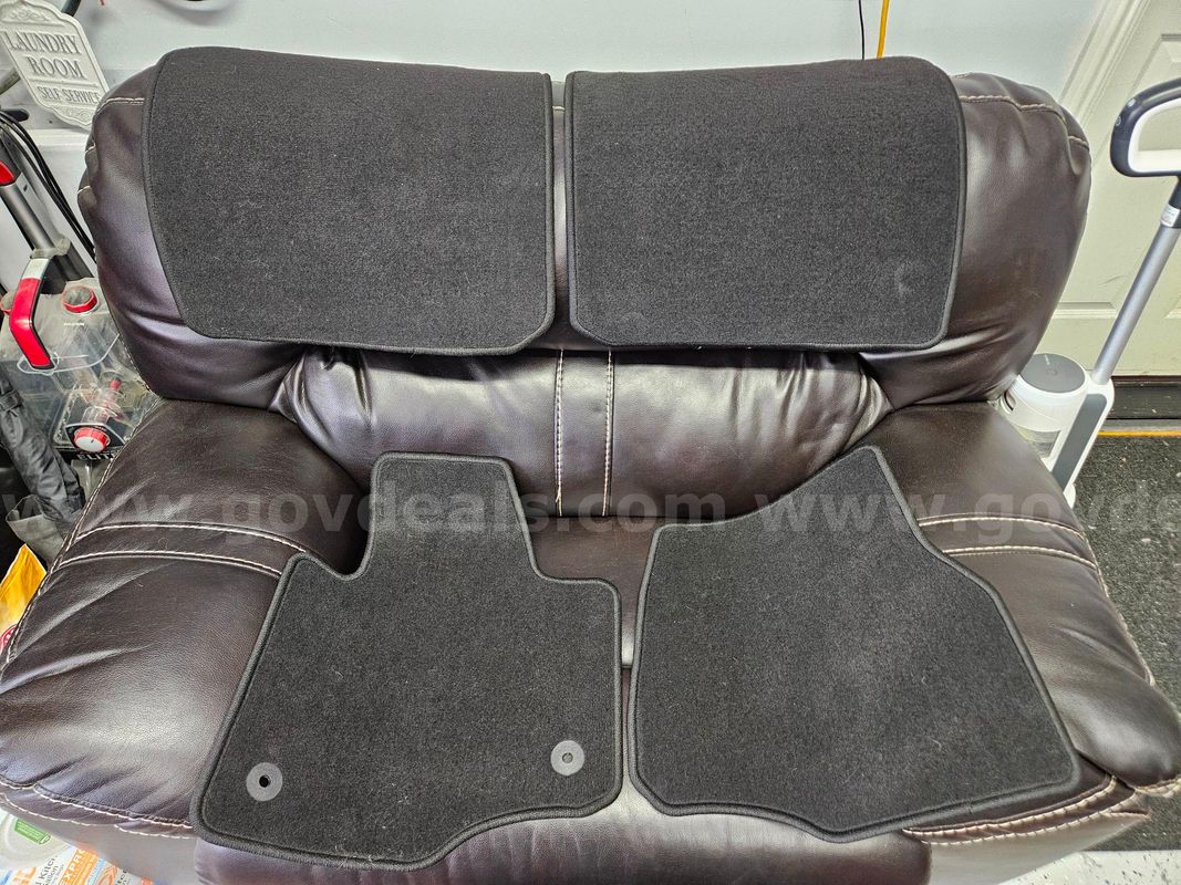 Lot of (4) NEW OEM Ford Expedition Black Carpet Floor Mats – 2024 Model
