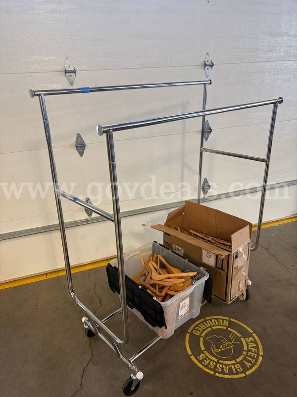 Chrome Rolling Clothing Display Rack With Wooden Hangers