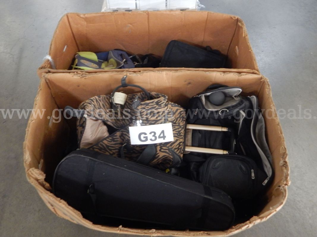 Lot G34 - (2) Boxes of Misc. Bags