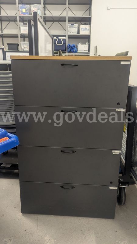 Tall grey filing cabinet