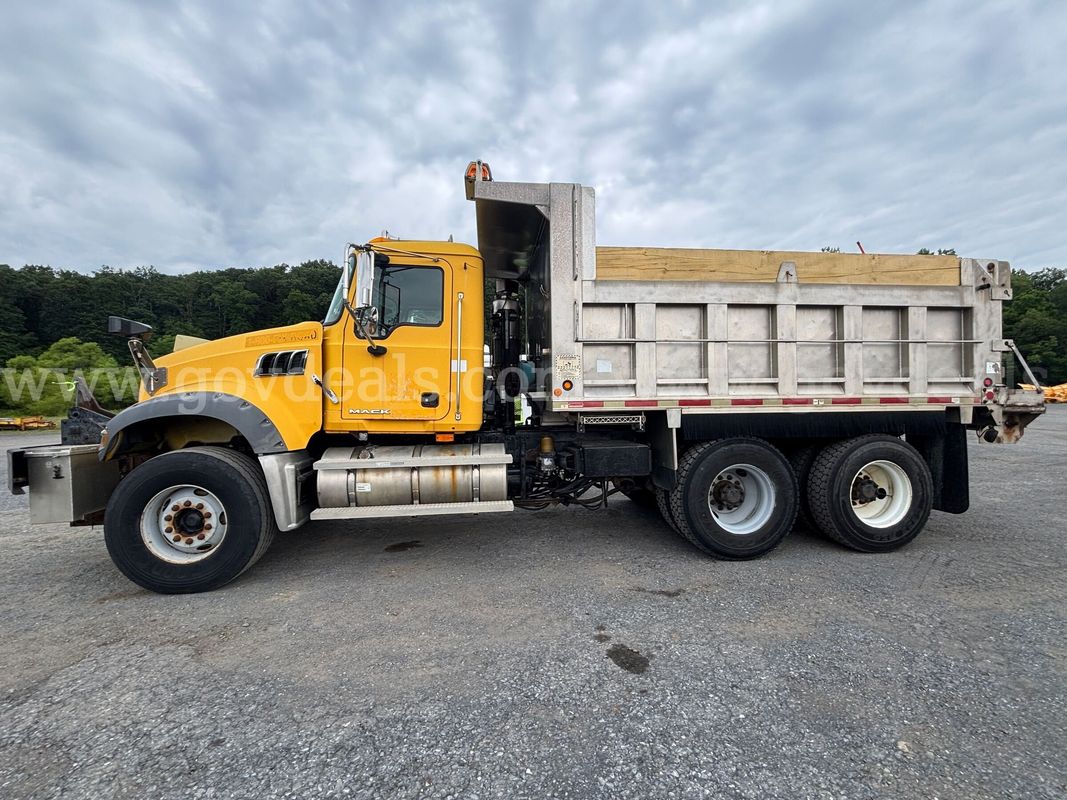 2008 Mack GU713 Cab‑Behind‑Engine Truck w/ Snow Equipment