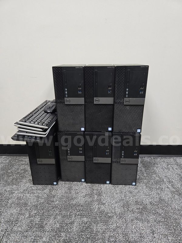 7 desktop towers, 5 keyboards, 2 mice