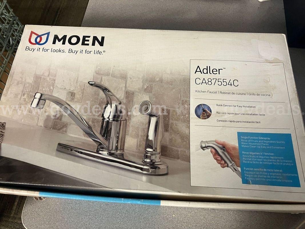 Moen Adler Single-Handle Kitchen Faucet with matching side sprayer in Chrome (Model CA87554C).