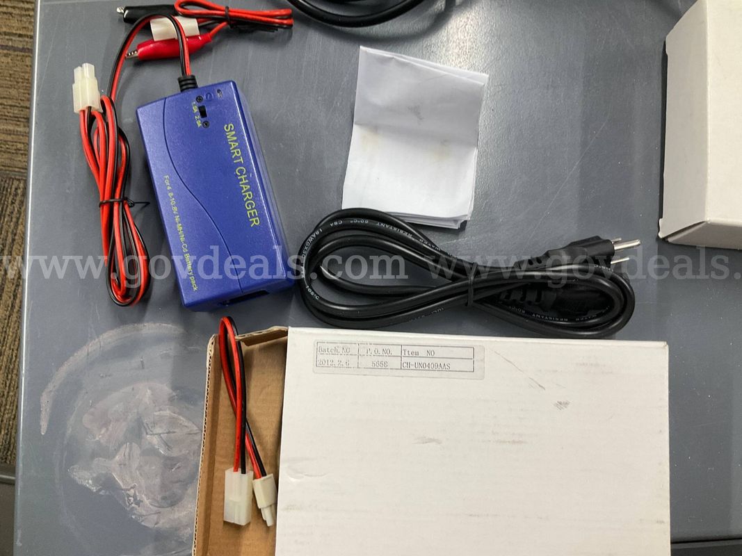 Lot of 4 Universal Smart Charger for 4.8V - 10.8V NiMH / NiCd Battery Packs (1.0A / 2.0A Switch) with xtra battery clamp
