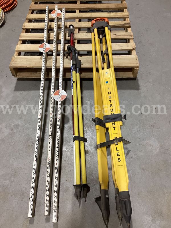 Surveying Equipment Lot: Heavy-Duty Tripod, Prism Poles & Leveling Rods