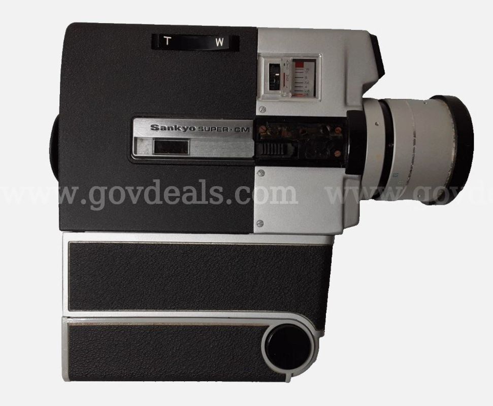 Vintage Sankyo Super CM 300 f: 1.8 9-30 mm Super 8 Movie Camera