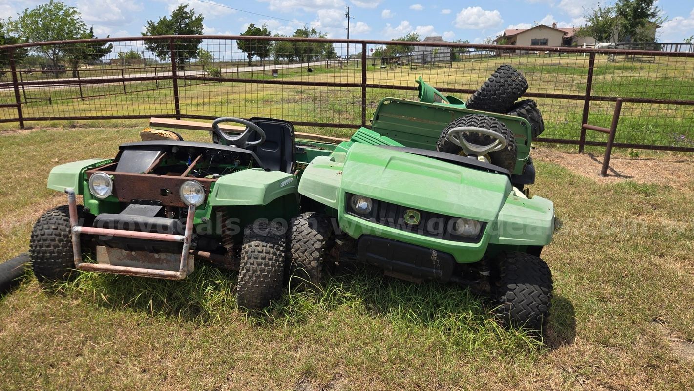 2 John Deere Gators