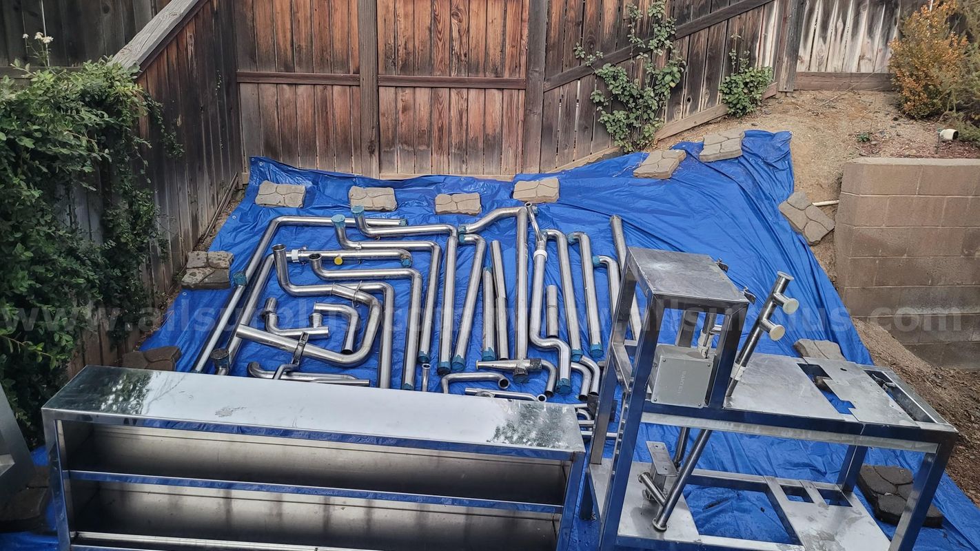 1,000 LBS LOT VARIOUS SANITARY STAINLESS PIPING AND PUMP FRAME & CABINETS