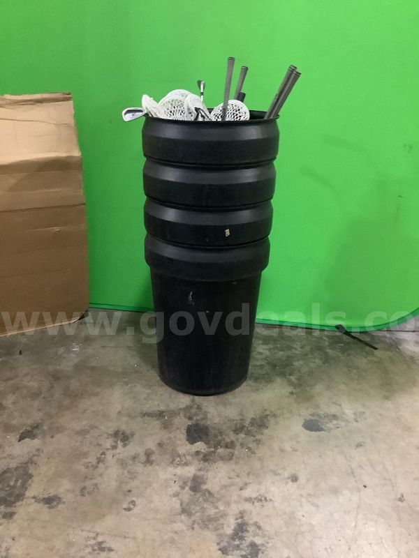 USED 4 TRASH CANS WITH MISCELLANEOUS SPORT EQUIPMENTS