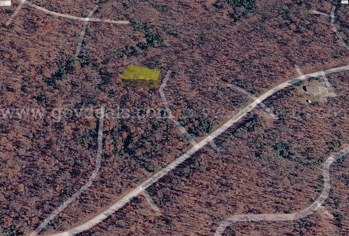 Finance this 0.25 acre lot in Idyllic Cherokee Village Arkansas