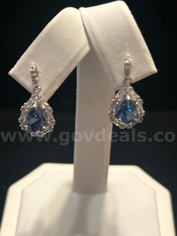 Rhodium Clad (Silver) CZ Light Blue Stone Dangling Earrings