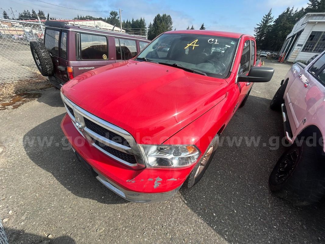 Red 2013 RAM 1500 SLT Quad Cab 2WD