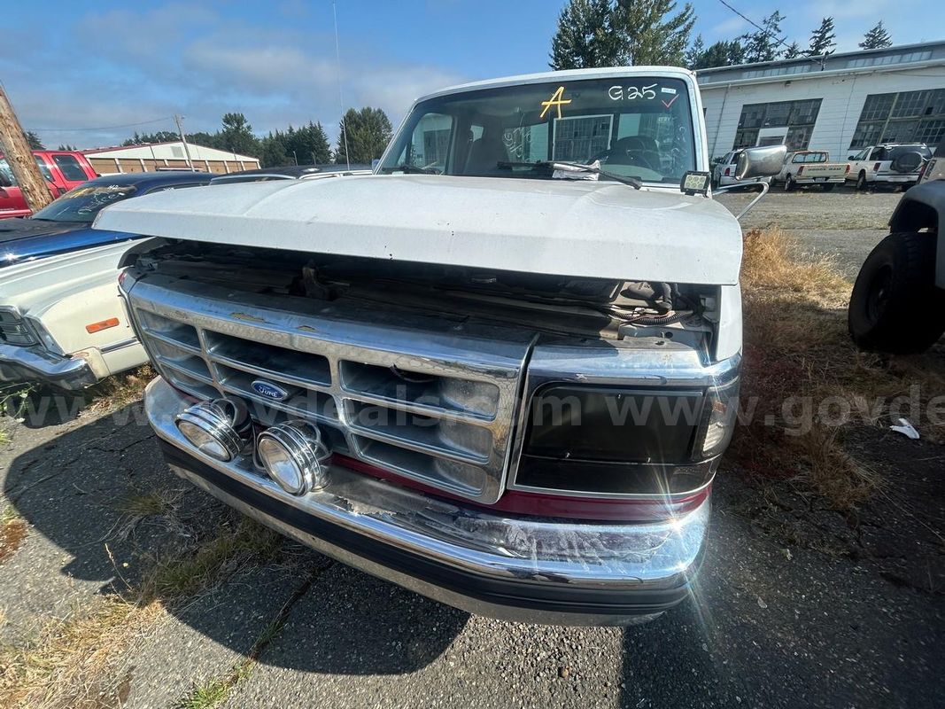 Red and White 1995 Ford F-150