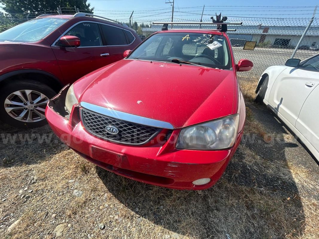 Red 2005 Kia Spectra5 Base