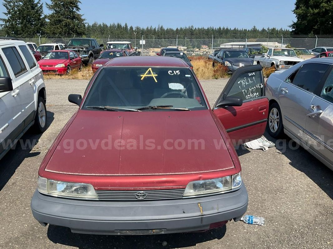 Red 1990 Toyota Camry