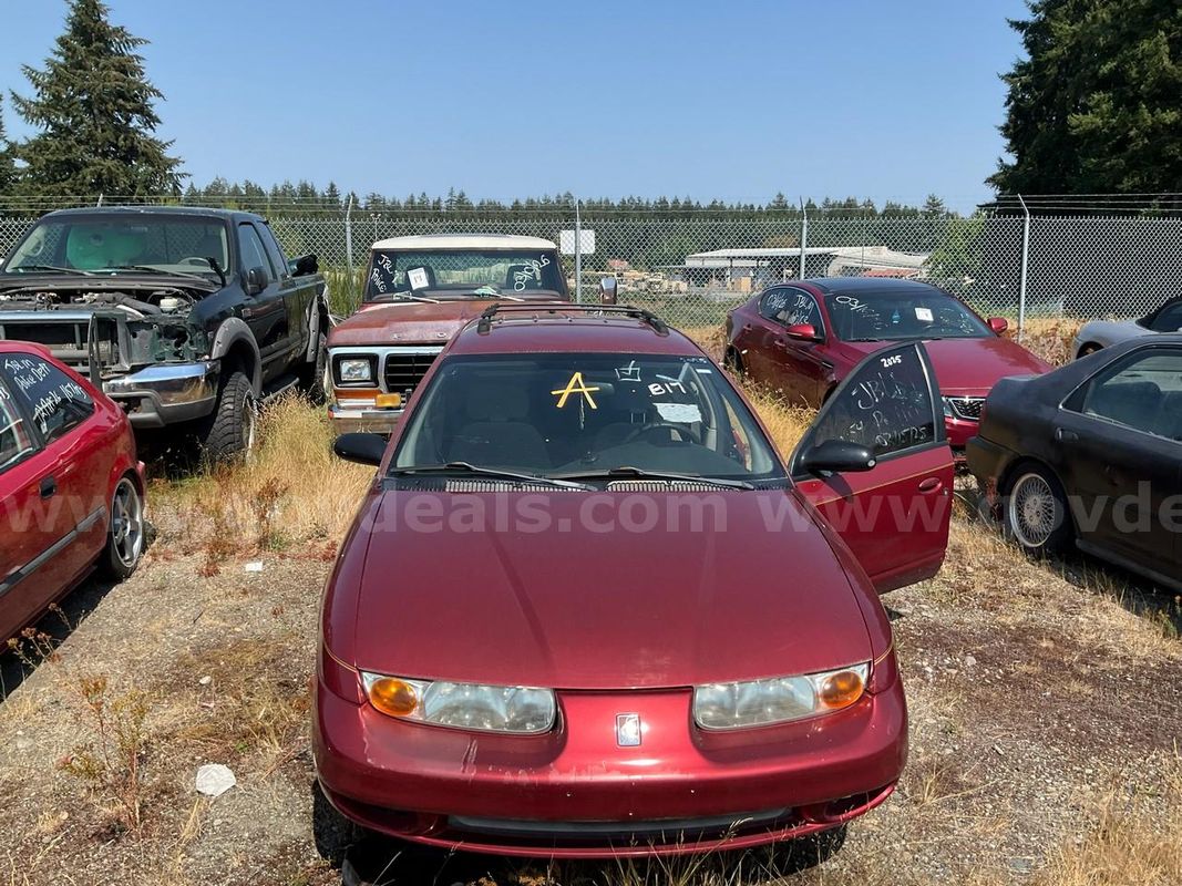 Red 2000 Saturn Wagon S-Series