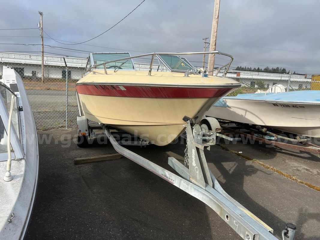 Century Boat with inboard engine and Escort Tailer.