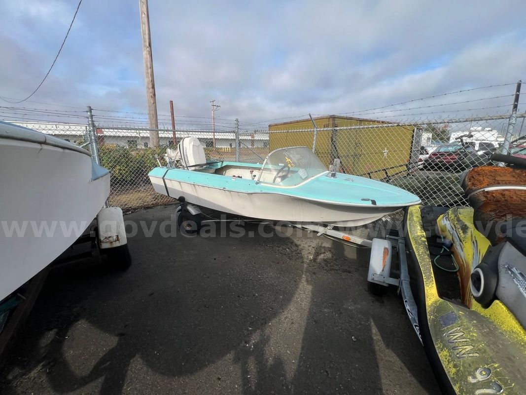 Fiberglass Boat with Johnson Outboard Motor and Trailer
