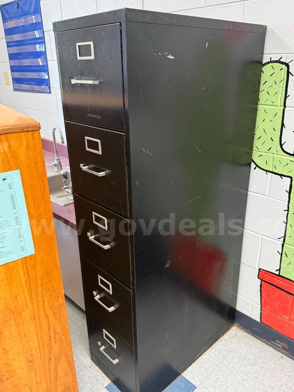 Three filing cabinets