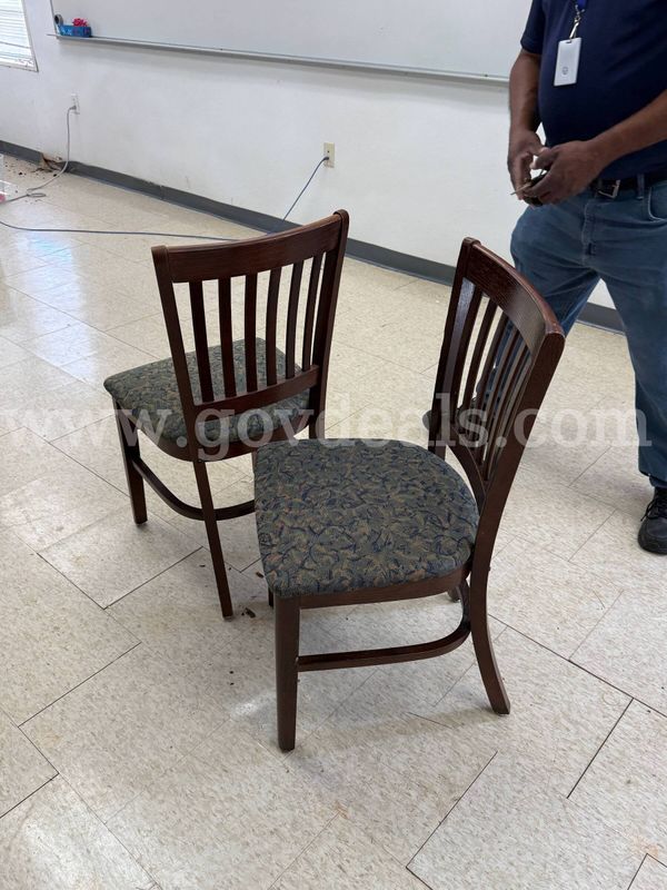 Eight wooden chairs