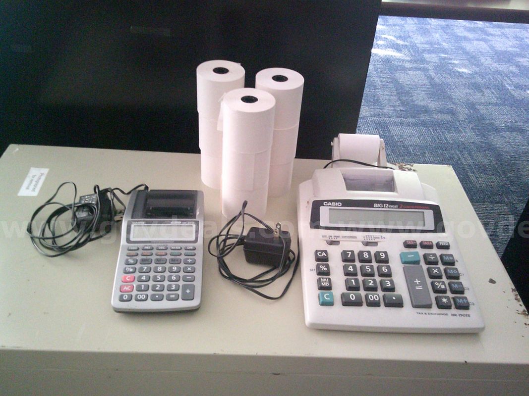 2 Adding Machines, 2 Electric Staplers, and 5 two hole punchers