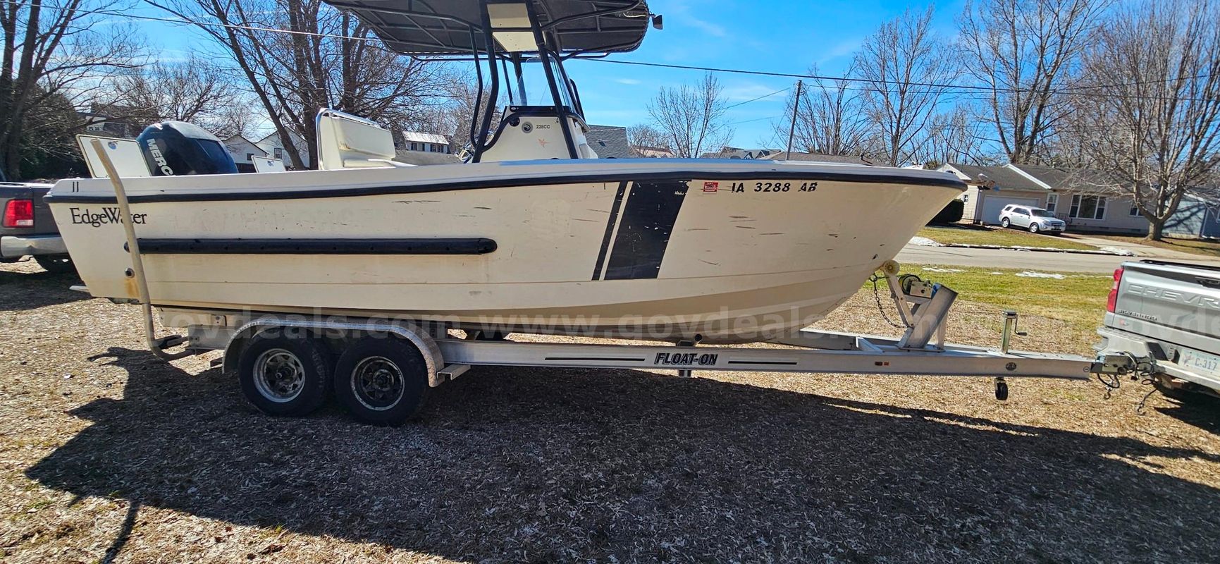 Edgewater Boat, Mercury Motor and Float-On Trailer