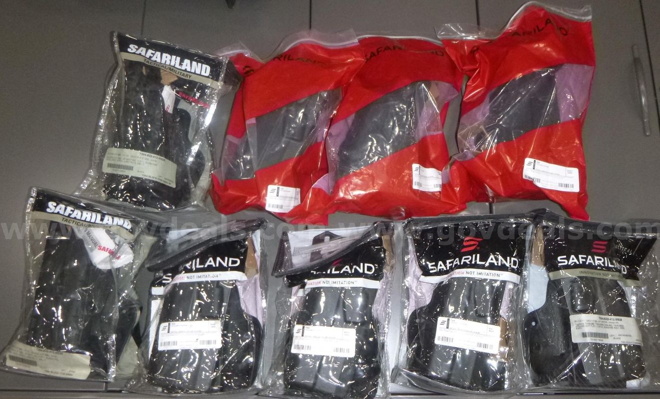 9 Glock holsters in package, Safariland