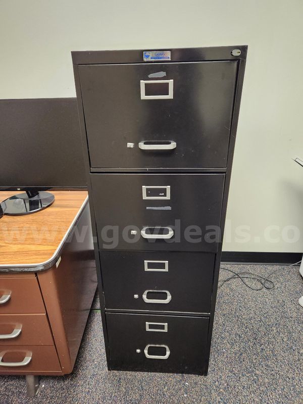 Used black 4 drawer filing cabinet x 2
