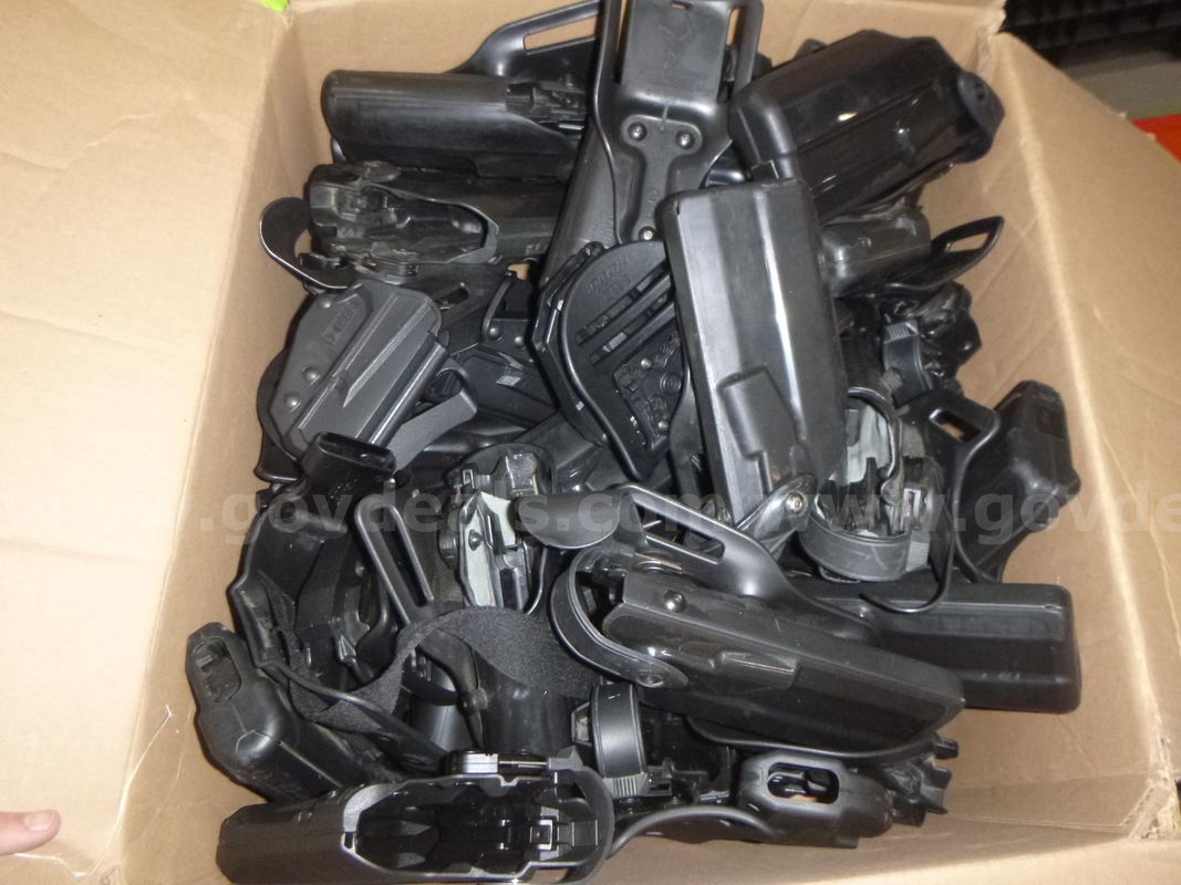 lot of misc equipment, 25 glock holsters, toolbox, books, scale