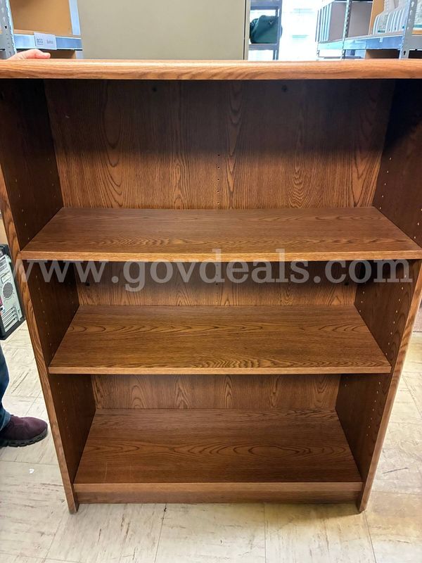 Office desk, book shelf, round table