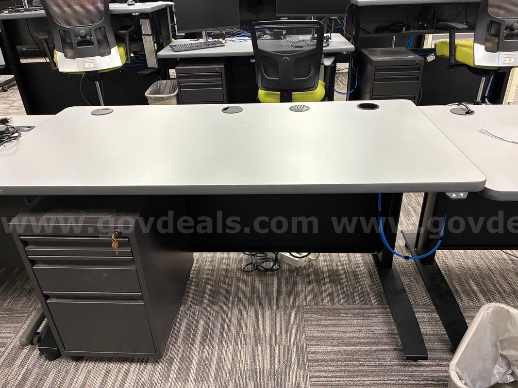 Sit-stand desks, under desk cabinets, table, chairs, file cabinet