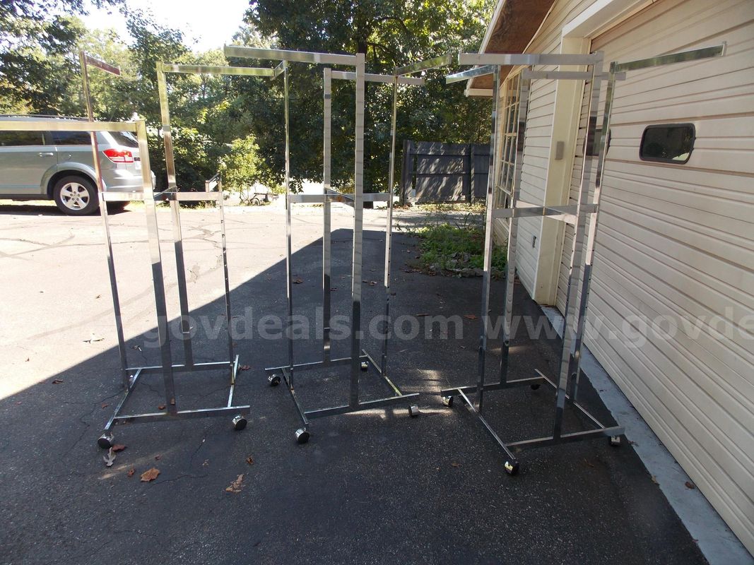 3 - USED Straight Arm Clothes Rack - 4 Wheels ADJUSTABLE