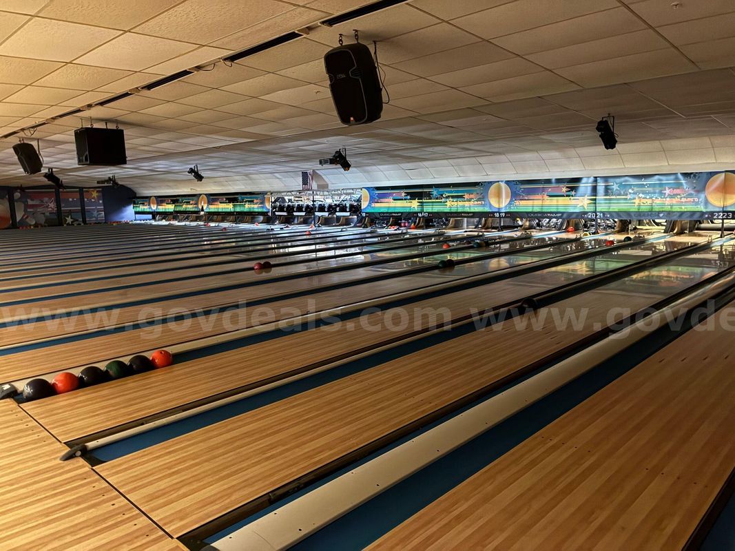 Lot of 24 QubicaAMF 90XLi Bowling Pinspotters & Bowling Alley Wood Flooring