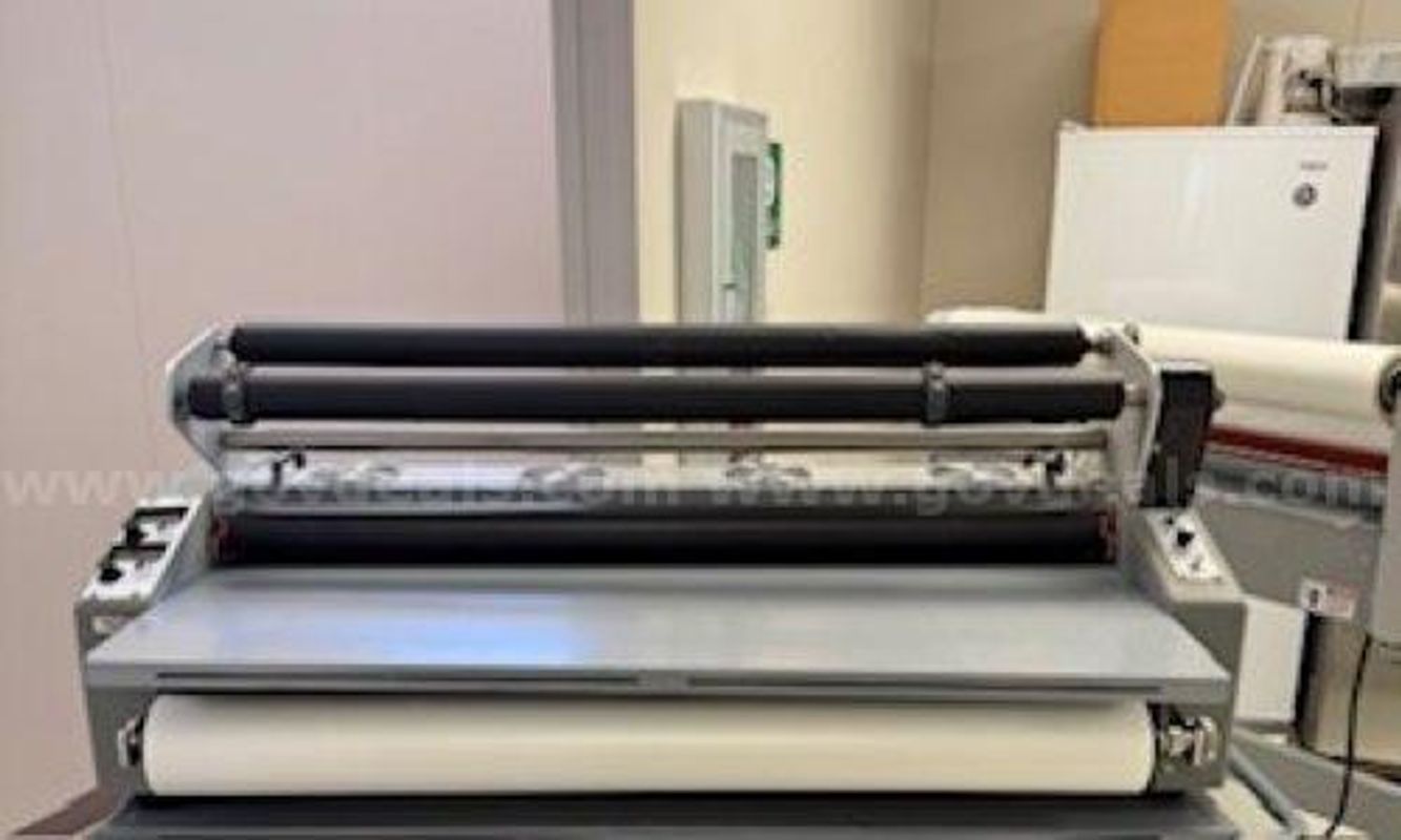 Laminator with 4 rolls of laminate