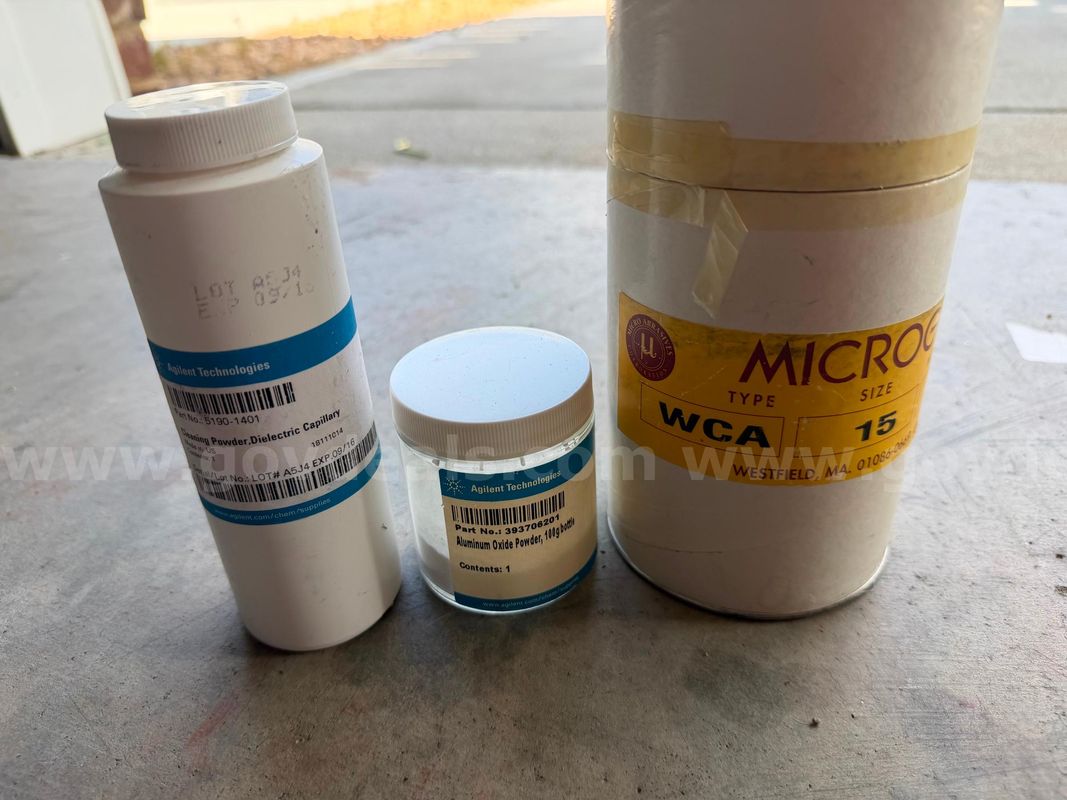 Lot of laboratory and industrial-grade abrasive/cleaning powders from Agilent Technologies and Micro Abrasives.