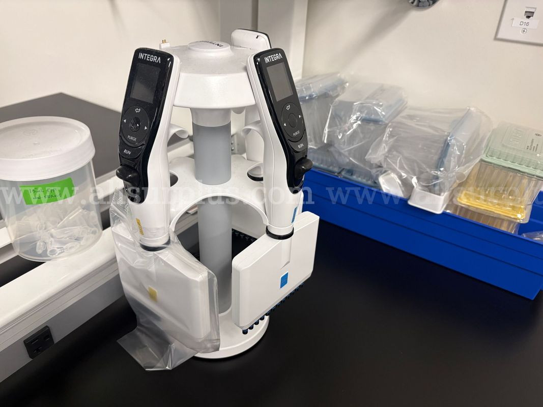 4 Pcs., Integra Viaflo II Electronic Pipettes w/ Charging Stand and 13 Boxes of Griptips