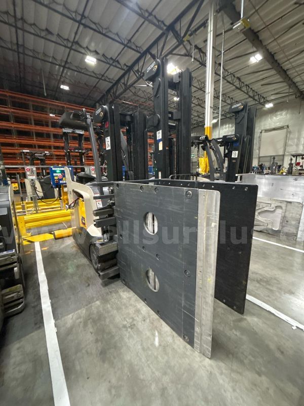 Crown RC 5500 Series Stand-Up Electric Forklift with Carton Clamp