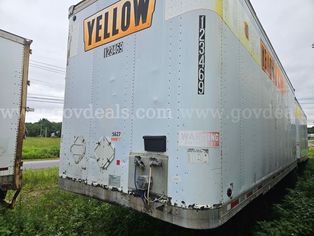 2002 Fruehauf 28FT X 102IN dry van trailer with rollup rear door