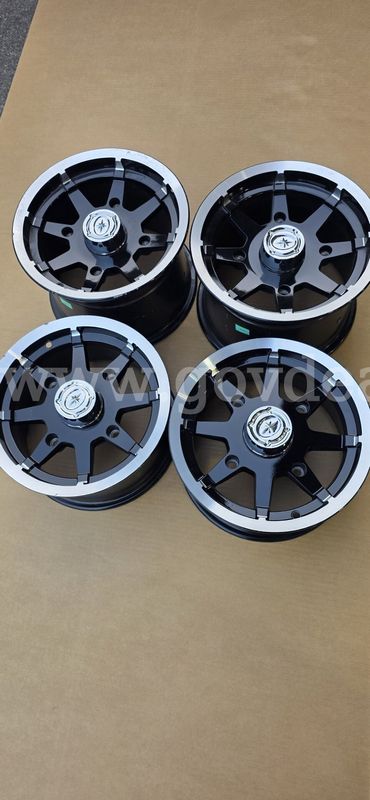 LOW RESERVE! BRAND NEW Polaris Wholesale Lot: 18 Custom Wheels, Roll Cages, Heave Duty Winch Bumper & Steering Tie Rods