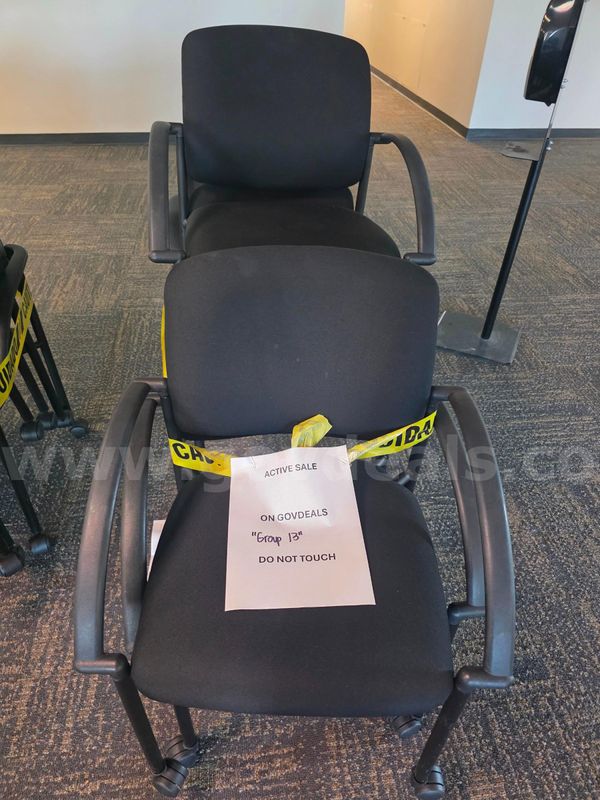 5 black office chairs