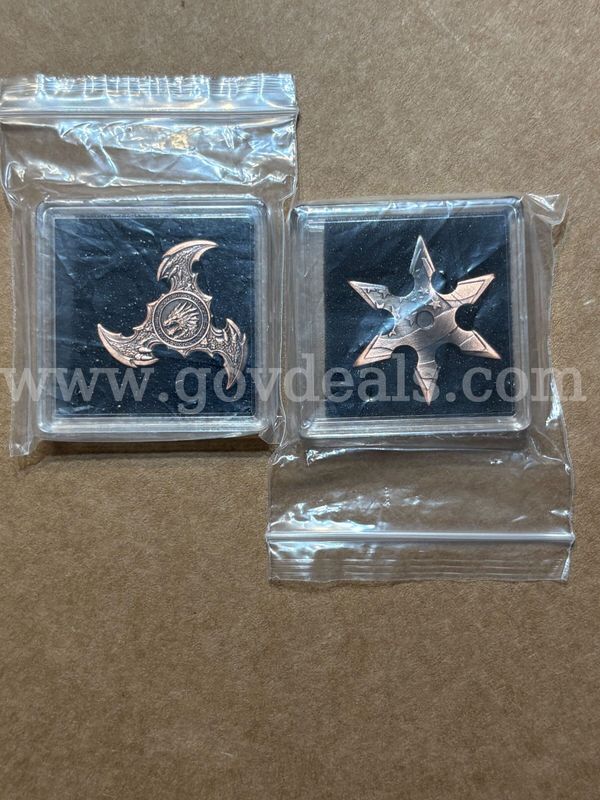 Two 5 gram .999 copper throwing stars