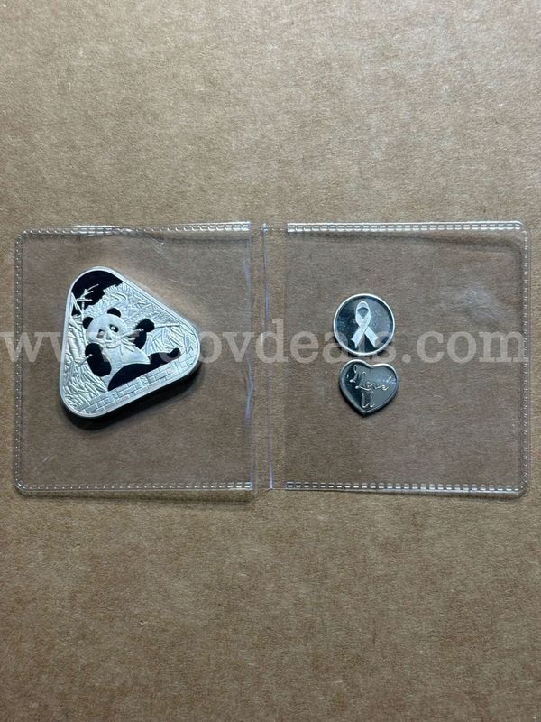 One ounce.999 copper panda & two 1gram .999 silver