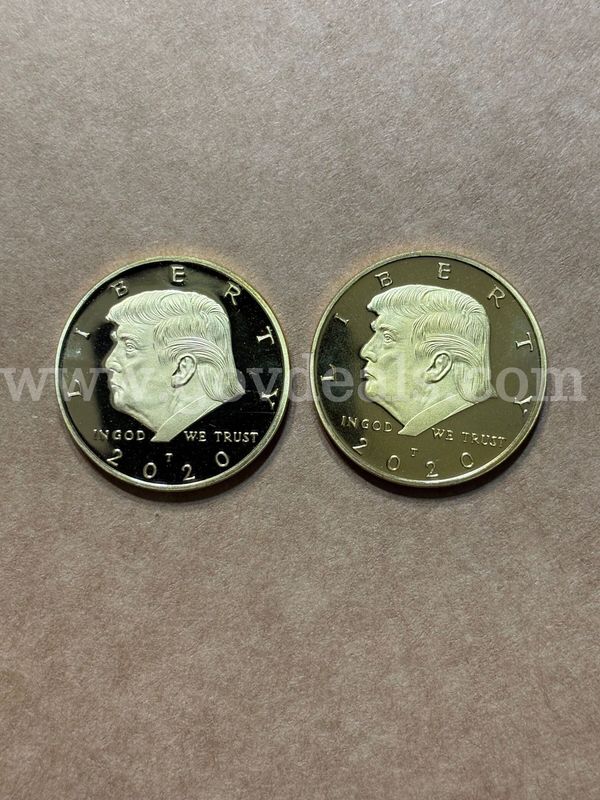 Two 2020 gold tone Trump Liberty dollar UC