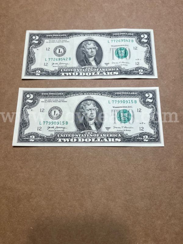 Two $2 Federal Reserve Notes