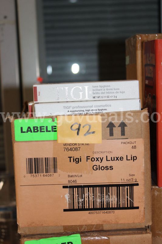 Tigi Cosmetics 764087 Luxe Lip Gloss In Foxy Color .11Fl Oz, lot contains 96 units.