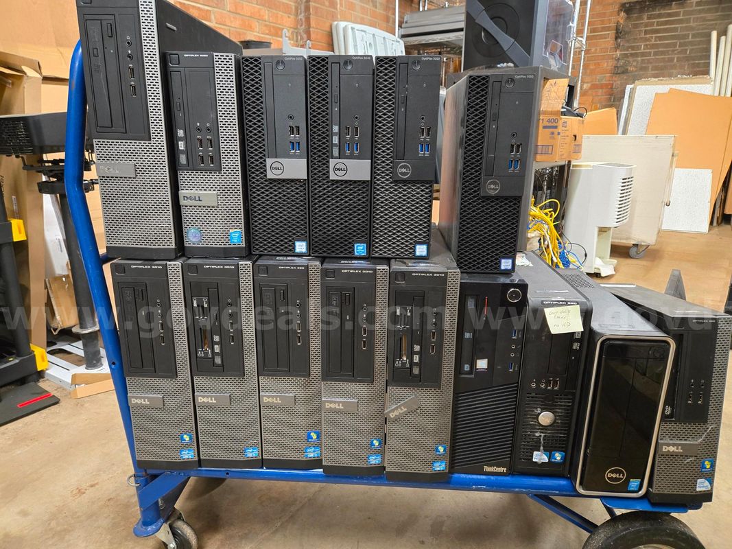 15 desktop computers, 1 laptop, and 4 keyboards